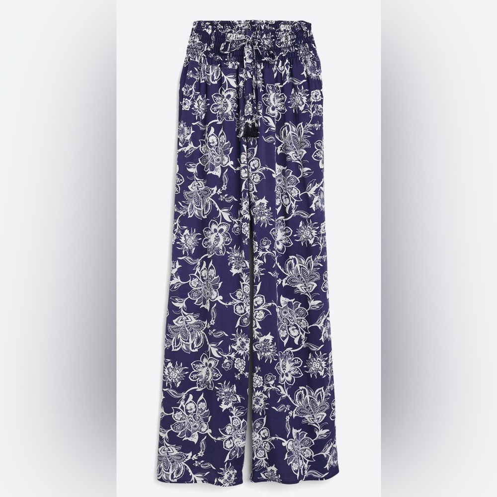 Floral pants with elastic waist band. Never worn. Bundle multiple items & save!